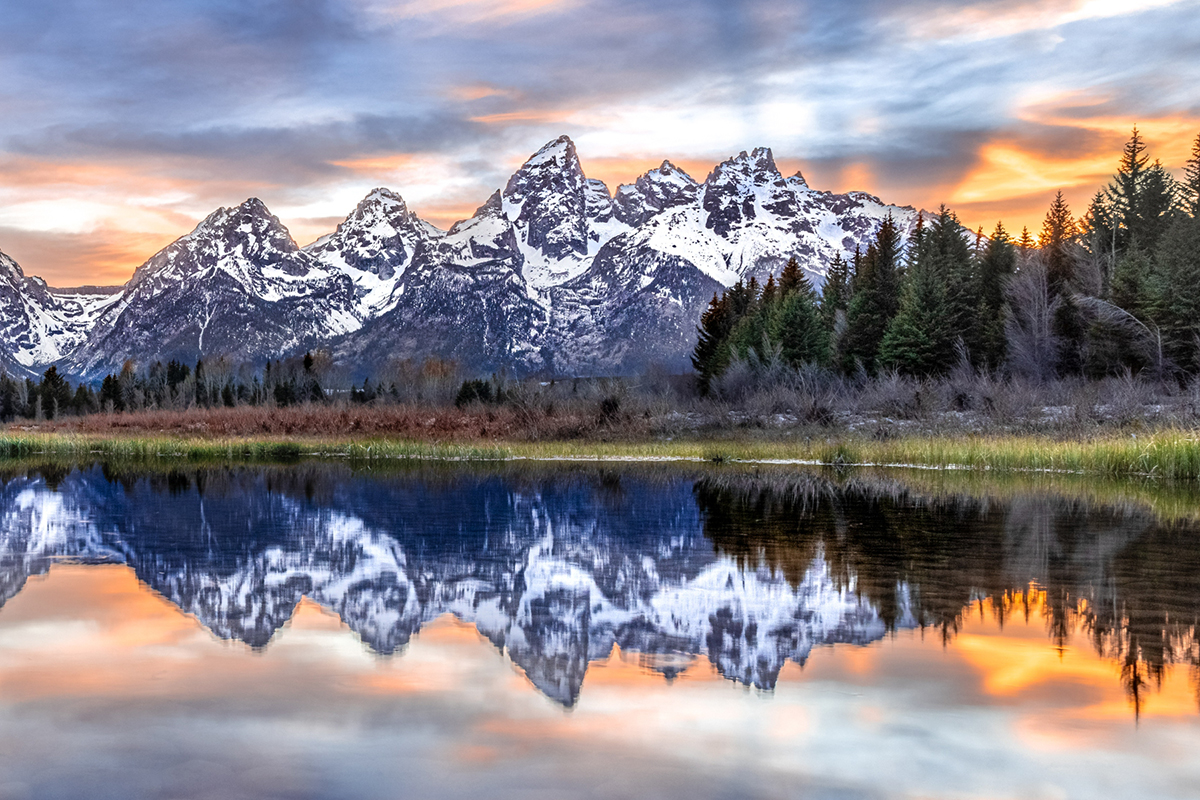 Sky reflected in the Snake River as sun sets behind Grand Teton Mountain. © Richard DeYoung/TNC Photo Contest 2021